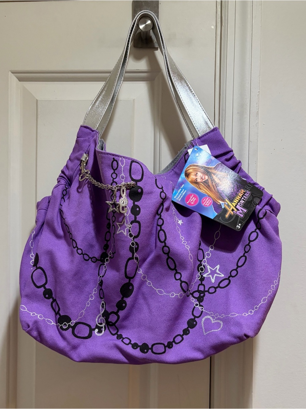 NWT Disney’s Hannah Montana Purple Shoulder Bag with Silver Detachable Charm